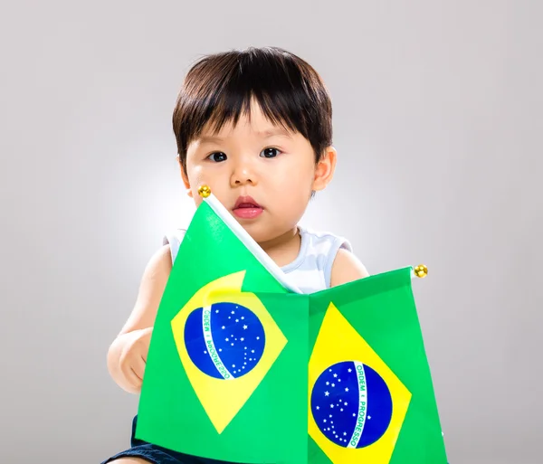 Pequeno bebê segurando bandeira barzil — Fotografia de Stock