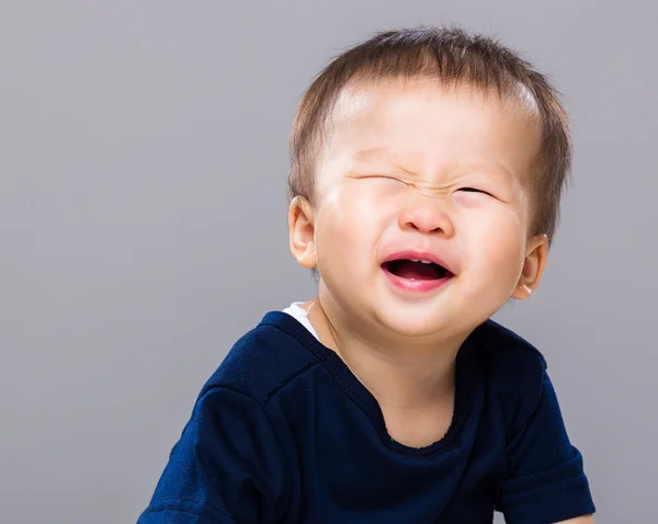 Baby boy winking eye — Stock Photo, Image