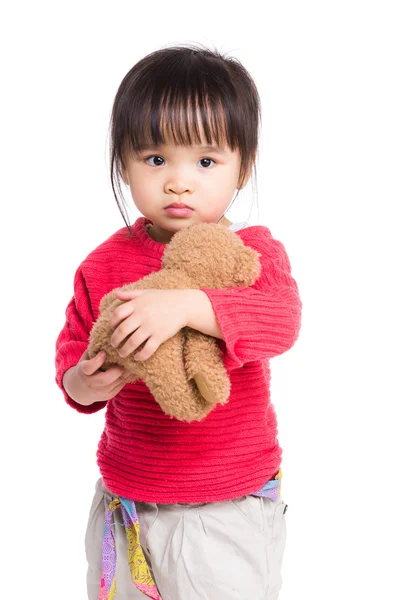 Girl with doll bear Stock Picture