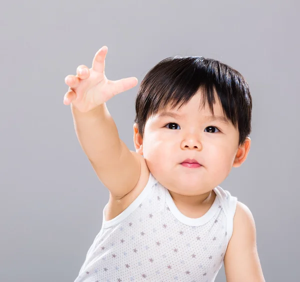 Baby boy want to get somthing in front — Stock Photo, Image