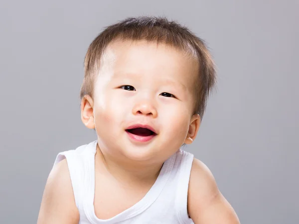 Zoete baby jongen glimlach — Stockfoto