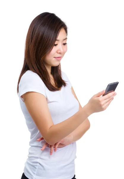 Asian woman looking at mobile phone — Stock Photo, Image