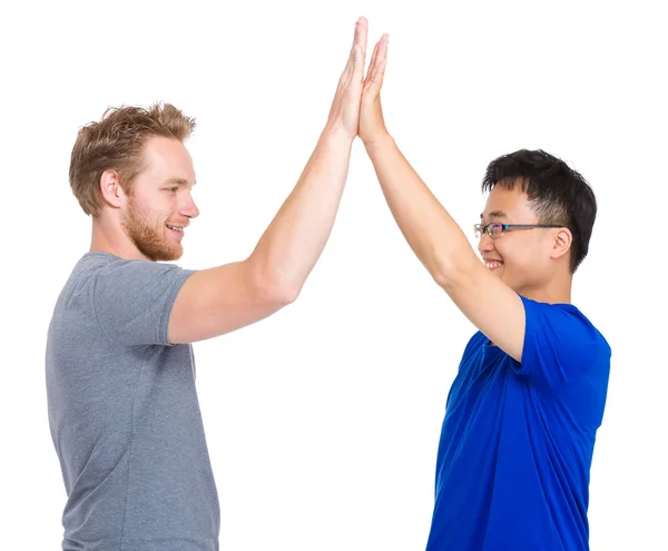Men give high five for each other