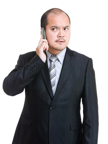 Hombre de negocios enojado hablando por teléfono — Foto de Stock