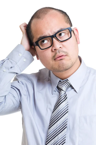 Businessman scratching head — Stock Photo, Image