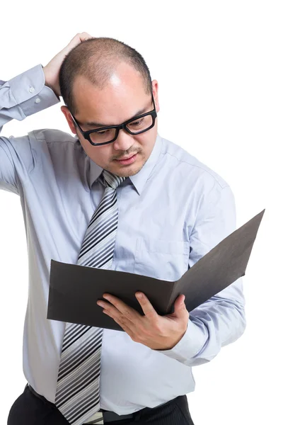 Stressed businessman and looking at file pad — Stock Photo, Image