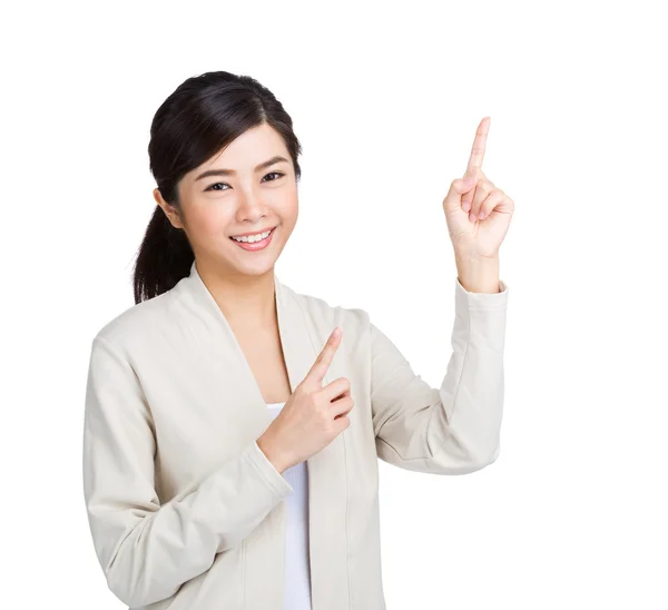 Asian woman with two finger pointing up — Stock Photo, Image
