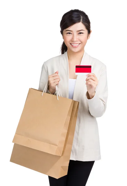 Asian woman using credit card with shopping bag — Stock Photo, Image