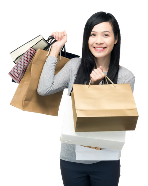 Jovem mulher segurando saco de compras — Fotografia de Stock