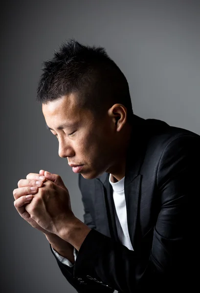 Young man praying — Stock Photo, Image