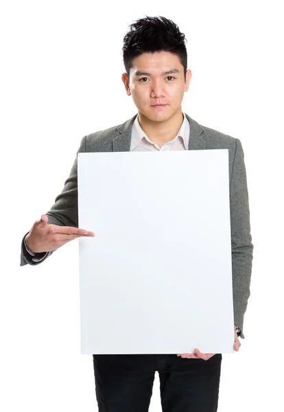 ビジネスマンを保持する何かを提示する空白板 — ストック写真