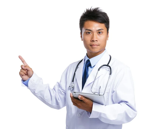 Male doctor hold tablet and finger up — Stock Photo, Image