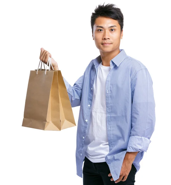 Asya insan kağıt torba taşımak — Stok fotoğraf