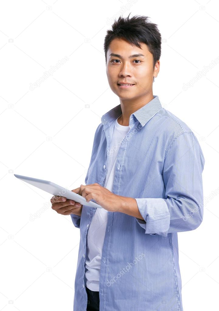 Asian man with tablet