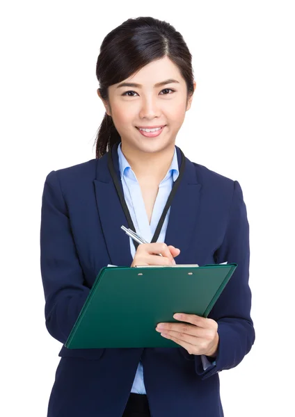 Businesswoman write on clipboard — Stock Photo, Image