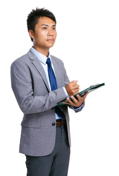 Businessman write on clipboard — Stock Photo, Image