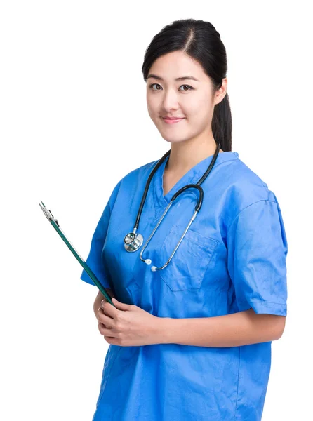 Female doctor with clipboard — Stock Photo, Image