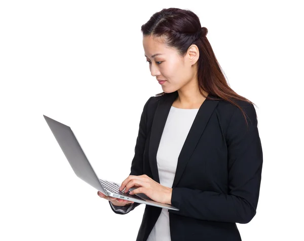 Asian business woman look at laptop computer — Stock Photo, Image