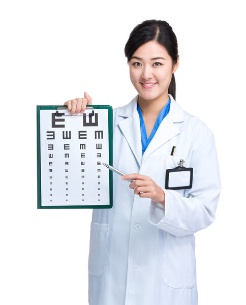 Optician doctor with eye chart and pen