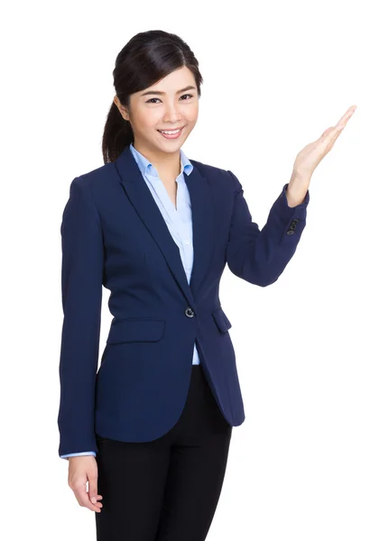 Business woman with hand presentation — Stock Photo, Image