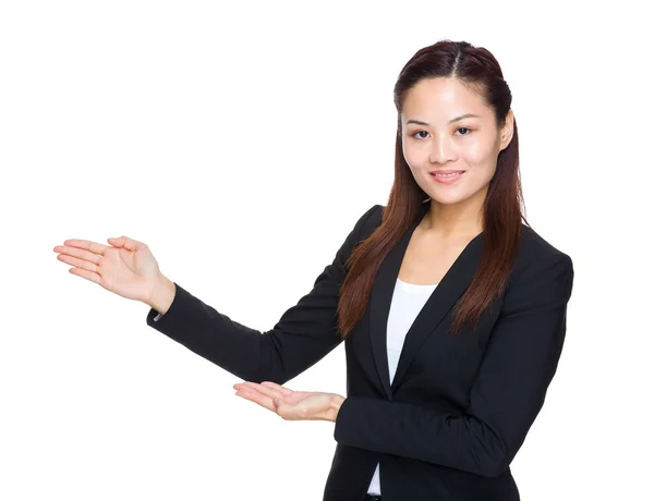 Business woman with hand presentation — Stock Photo, Image