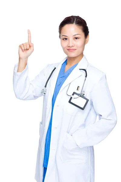 Mujer doctora con el dedo arriba —  Fotos de Stock