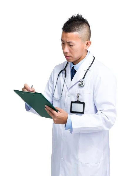Male doctor write on clipboard — Stock Photo, Image