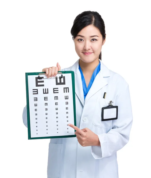 Asian doctor with eye chart — Stock Photo, Image