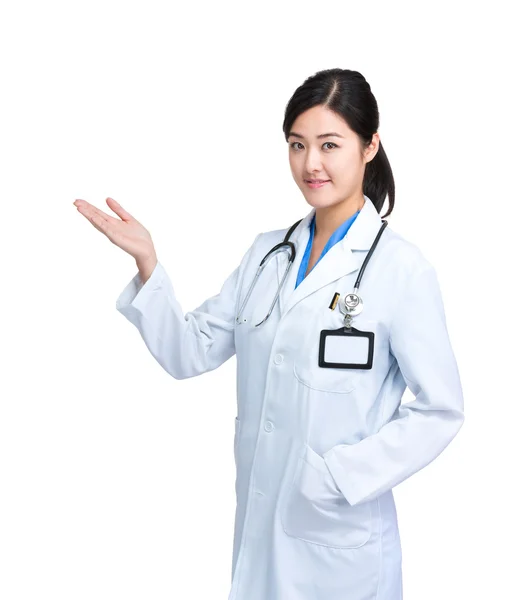 Woman doctor with hand presentation — Stock Photo, Image