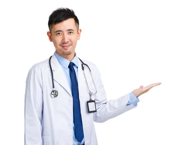 Medical doctor with hand present — Stock Photo, Image
