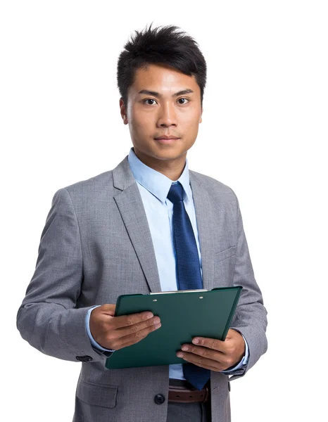 Asian businessman with clipboard — Stock Photo, Image