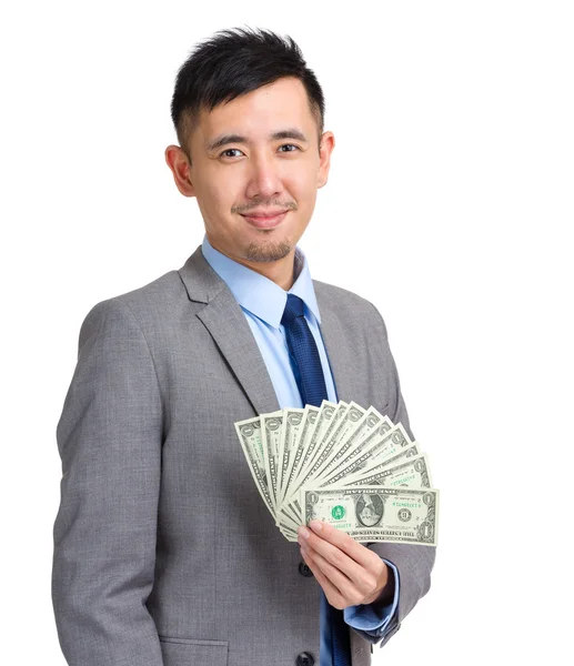 Uomo d'affari tenere con i soldi — Foto Stock
