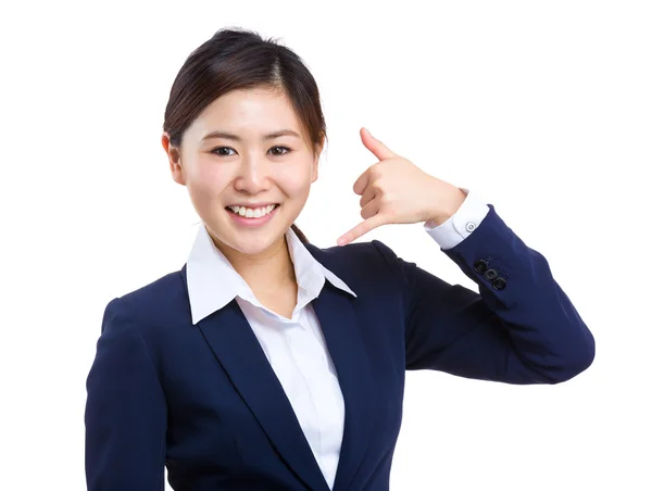 Businesswoman with call gesture — Stock Photo, Image