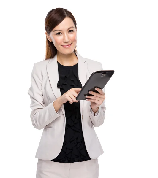 Young business woman using tablet on white background — Stock Photo, Image