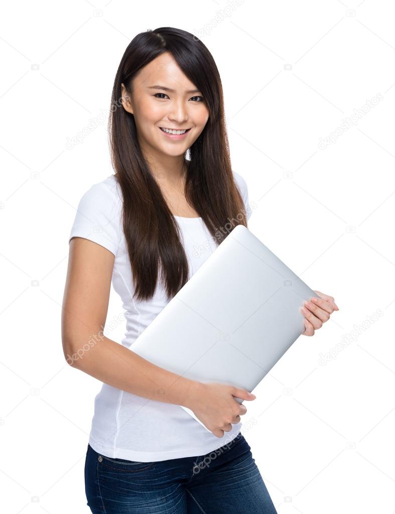 Asian woman with laptop on white background