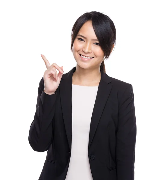 Mujer de negocios confiada con el dedo hacia arriba — Foto de Stock