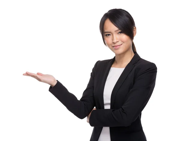 Asiatische Geschäftsfrau mit der Hand anwesend — Stockfoto