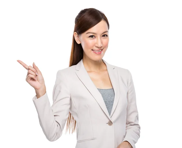 Businesswoman pointing by finger — Stock Photo, Image