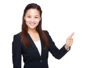 mujer de negocios asiática con el pulgar para arriba
