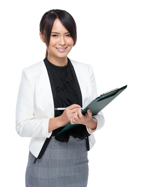 Businesswoman write on clipboard — Stock Photo, Image