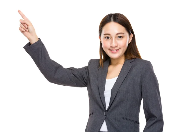 Businesswoman pointing by finger — Stock Photo, Image