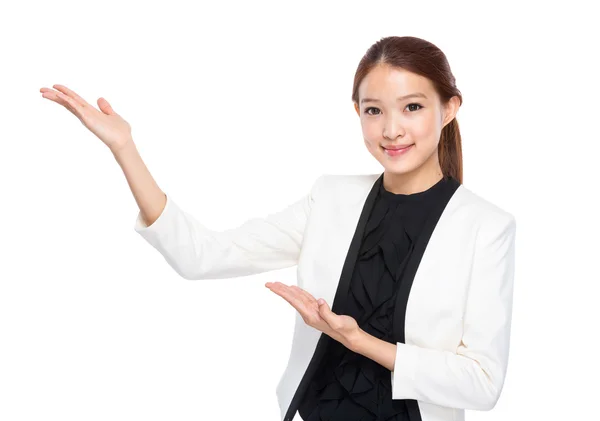Businesswoman present by hands — Stock Photo, Image