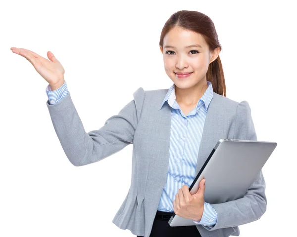 Businesswoman with laptop computer and open hand palm — Stock Photo, Image