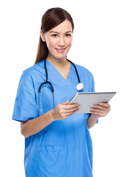 Woman doctor use digital tablet Royalty Free Stock Photos