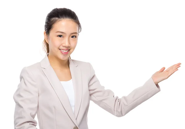Asian businesswoman with hand presentation — Stock Photo, Image