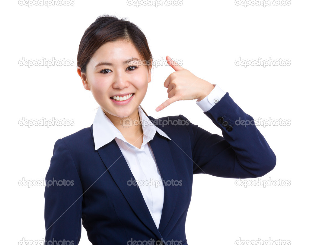 Businesswoman with call me sign