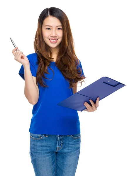 Woman with clipboard and pen up — Stock Photo, Image