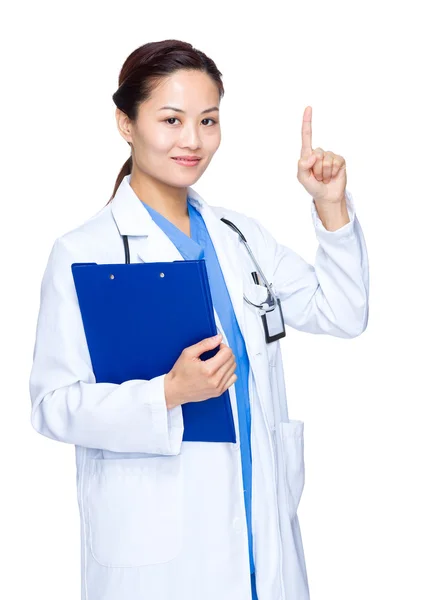 Asian doctor with clipboard — Stock Photo, Image