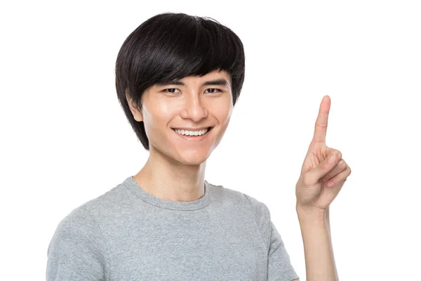 Asyalı genç adamın parmak ile — Stok fotoğraf