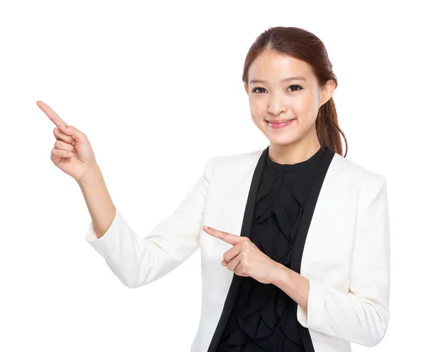 Businesswoman with two finger point aside — Stock Photo, Image